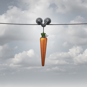Enticement And Motivation Concept As A Carrot Pulled On A Wire As A Metaphor For Marketing Reward To Attract And Encourage A Followed With A 3D Render.